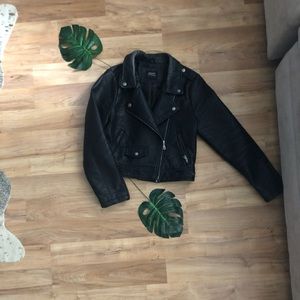 Gently worn, black, thick vegan leather jacket
